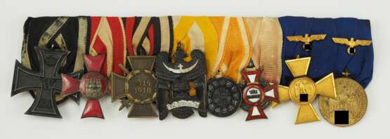 Große Ordenschnalle mit 8 Auszeichnungen eines Veteranen beider Weltkriege und Lebensretters aus Hamburg. - фото 1