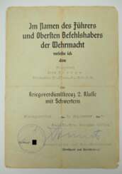 Kriegsverdienstkreuz, 2. Klasse mit Schwertern Urkunde für einen Feldwebel der Feldgendarmerie Tr./ Fallschirm-Panzer-Division "Hermann Göring".