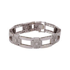Armband mit 7 Diamanten im Prinzessschliff, zusammen ca. 0,85 ct