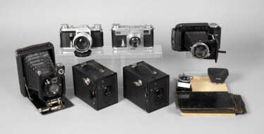 Sechs Fotoapparate