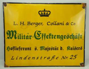 Emailleschild des Militär-Effektengeschäfts L.H. Berger, Collani & Co.