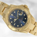 Armbanduhr: luxuriöse Rolex Herrenuhr, Yachtmaster Ref.16628 in Vollgold, Originalpapiere, Chronometerbescheinigung und Rolex Kalender von 2003 - фото 1