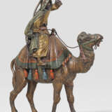 Araber beim Kamelreiten - photo 1