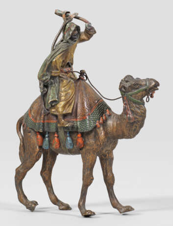 Araber beim Kamelreiten - Foto 1
