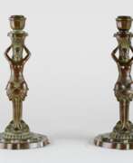 Allegory. Pair candlesticks in art Deco style.