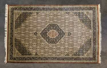 Orientteppich aus Seide. GHOM/IRAN, 20. Jahrhundert, ca. 200x136 cm