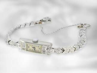 Armbanduhr: äußerst hochwertige und reich mit Diamanten besetzte Art déco Platin-Damenuhr im Stil der Cartier-Duoplan "Baguette", ca. 1925, No.518
