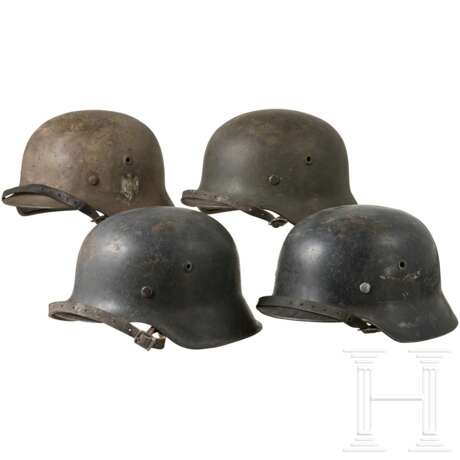 2. Weltkrieg - vier deutsche Stahlhelme - фото 1