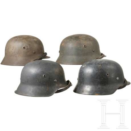 2. Weltkrieg - vier deutsche Stahlhelme - фото 2