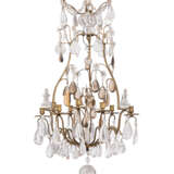 A FRENCH GILT-METAL, CLEAR AND AMBER ROCK CRYSTAL NINE-LIGHT CHANDELIER - фото 1