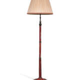 A PATINATED-BRONZE AND RED-GLASS STANDING LAMP - фото 1