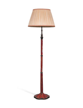 A PATINATED-BRONZE AND RED-GLASS STANDING LAMP - photo 1