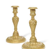 A PAIR OF FRENCH ORMOLU CANDLESTICKS - photo 1