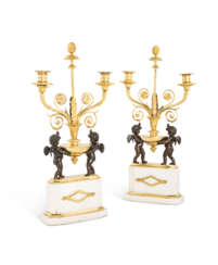 A PAIR OF LATE LOUIS XVI ORMOLU, PATINATED-BRONZE AND WHITE MARBLE TWO-LIGHT CANDELABRA