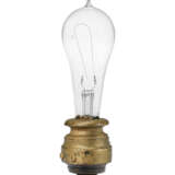Edison works on his lightbulb - photo 10