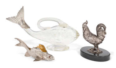 A SILVER-MOUNTED CUT-GLASS FISH-FORM CLARET JUG, A GEM-SET SILVER FISH-FORM SALT, AND A SILVER MODEL OF A COCKEREL