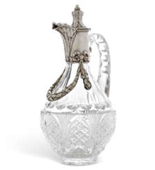A PARCEL-GILT SILVER-MOUNTED CUT-GLASS DECANTER