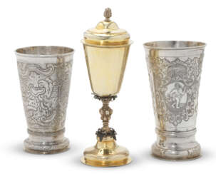 TWO SILVER BEAKERS AND A PARCEL-GILT SILVER CUP AND COVER