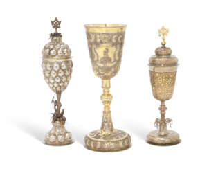 A PARCEL-GILT SILVER CHALICE AND TWO PARCEL-GILT SILVER CUPS AND COVERS