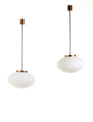 Pair of suspension lamps with flattened diffuser in lattimo incamiciato glass