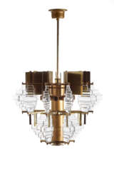 Suspension lamp with ten lights in brassed and gilded metal with elements in solid crystal glass arranged in a sunburst pattern