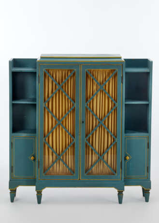 Egidio Roncoroni. Novecento bookcase in light blue painted wood made for a girl's room and composed of a central showcase and lateral bodies with open shelves and cabinet - photo 1