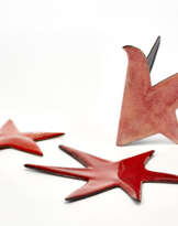 Lot of three copper sculptures glazed in shades of red