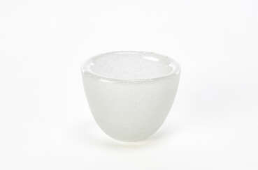 Cup in transparent colorless bubbles glass