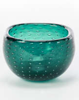 Transparent green sommerso glass bowl with inclusion of bubbles arranged regularly with rounded quadrangular rim