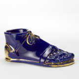 Piero Fornasetti. Piede | Partially gilded vitrus china sculpture depicting a foot with a shoe - photo 1