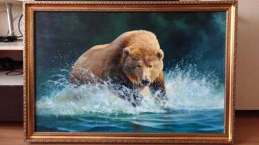 "Bear running through water"