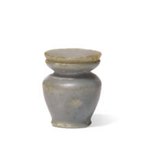 AN EGYPTIAN ANHYDRITE COSMETIC JAR AND LID