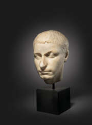 A ROMAN MARBLE PORTRAIT HEAD OF A MAN