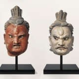 TWO IMPRESSIVE LARGE PAINTED STUCCO HEADS OF GUARDIAN KINGS ... - photo 1