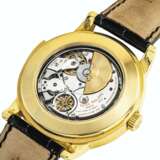 PATEK PHILIPPE A VERY RARE 18K GOLD AUTOMATIC “CATHEDRAL” MI... - photo 2