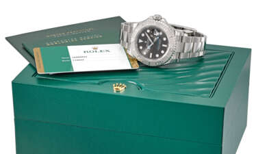 ROLEX A STAINLESS STEEL AUTOMATIC WRISTWATCH WITH SWEEP CENT...