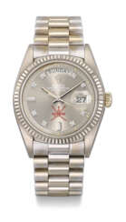ROLEX A VERY FINE AND RARE 18K WHITE GOLD AUTOMATIC WRISTWAT...