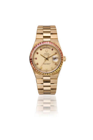 ROLEX AN EXTREMLY RARE AND ATTRACTIVE 18K GOLD AND MULTI-COL... - Foto 2