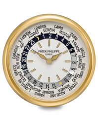 Inducta for Patek Philippe A large gilt brass world time wal...