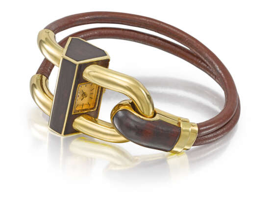 Van Cleef & Arpels A fine and rare 18K gold and walnut wood ... - фото 1