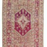 A GROUP OF FOUR GHIORDES CARPETS - фото 1