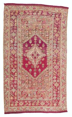 A GROUP OF FOUR GHIORDES CARPETS - photo 1