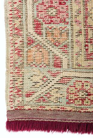 A GROUP OF FOUR GHIORDES CARPETS - photo 4