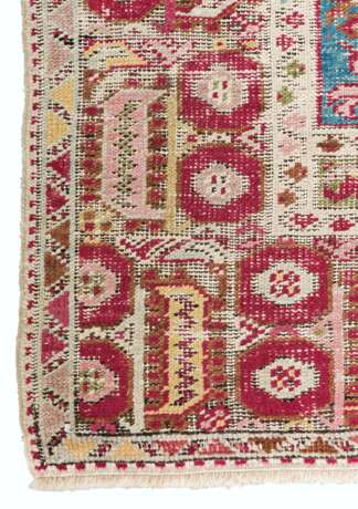 A GROUP OF FOUR GHIORDES CARPETS - photo 6