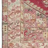 A GROUP OF FOUR GHIORDES CARPETS - photo 9