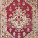 A GROUP OF FOUR GHIORDES CARPETS - photo 11