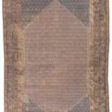 A GROUP OF FOUR GHIORDES CARPETS - photo 16