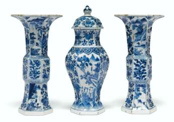 A CHINESE BLUE AND WHITE THREE-PIECE GARNITURE