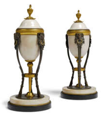 A PAIR OF NORTH EUROPEAN ORMOLU AND BRONZE-MOUNTED WHITE MAR...