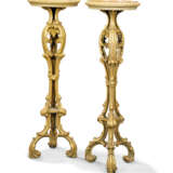 A PAIR OF GREEN-PAINTED AND PARCEL-GILT COMPOSITION TORCHERE... - photo 1